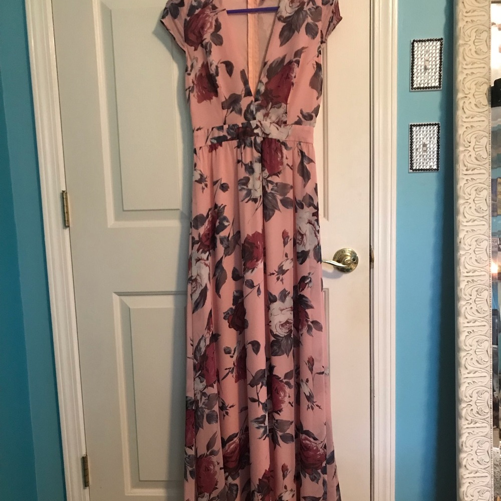 Floor length floral dress.